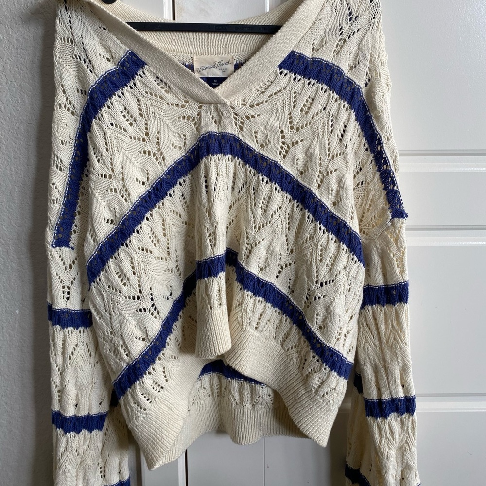 Sweater with design holes